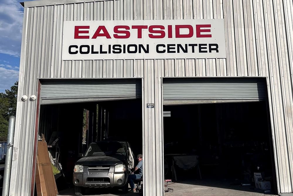 The Eastside Collision Center building on Highway 190 East